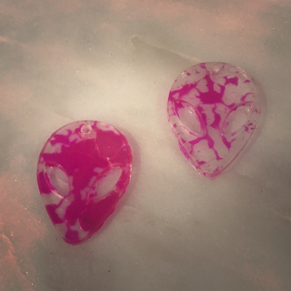 Clear and pink tie dye alien earrings